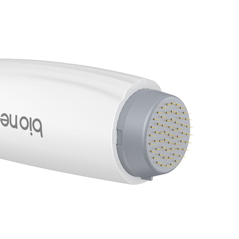 Bio Needle 60-Pin Scalp Derma Stamp angled view showing gold needles and ergonomic handle
