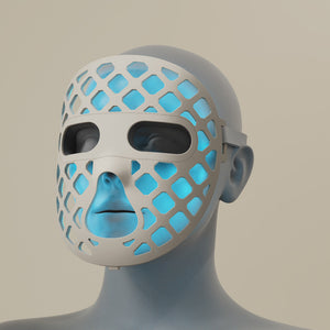 Featuring a Blue silicone LED light therapy mask, representing the Peachaboo Glo Aurora's advanced technology.