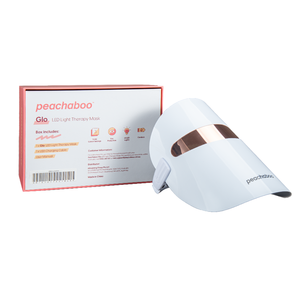 Peachaboo Glo LED Light Therapy Mask next to it's packaging (back facing) on a white background