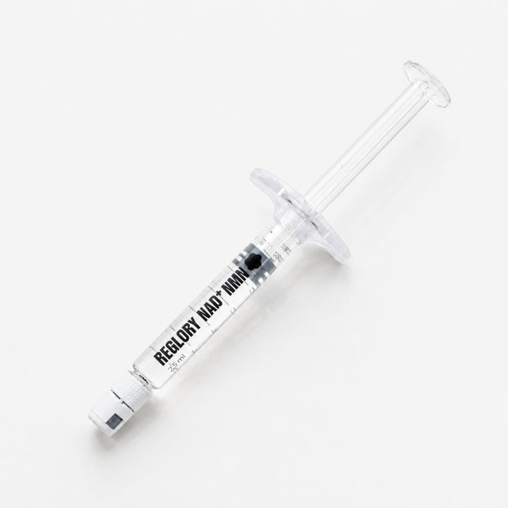 Close-up of Reglory NAD+ NMN 2.5 ml skin booster syringe on white background