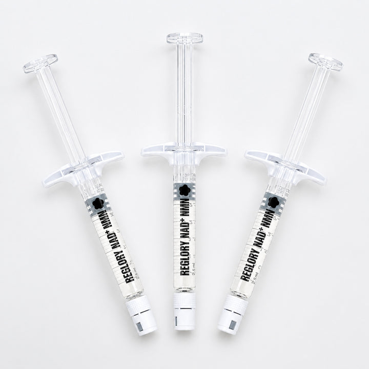 Three Reglory NAD+ NMN skin booster syringes arranged on a white background