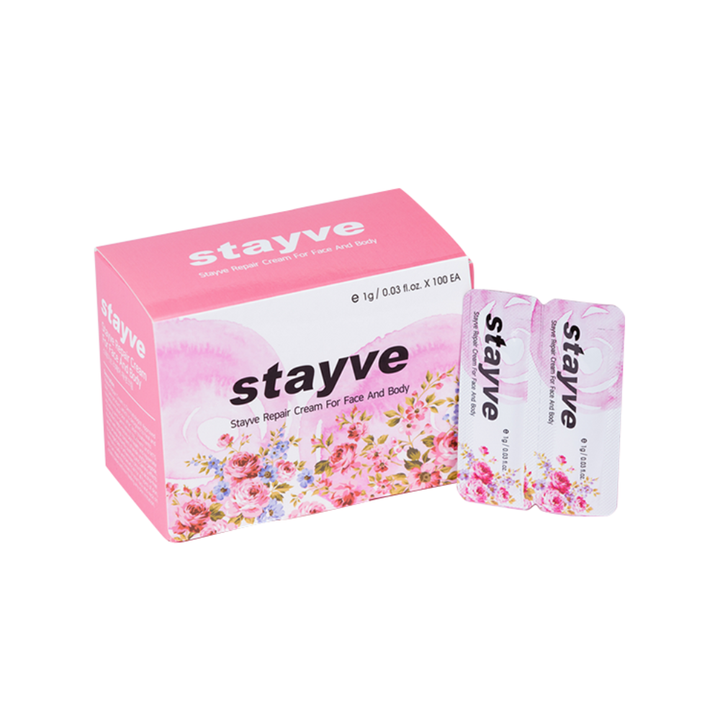 Stayve Repair Cream For Face And Body box with two individual floral sachets displayed beside it.