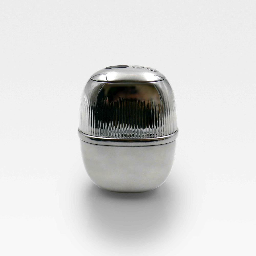 A silver metal container with a lid, designed for the RF Matrix Max Skin Tightening Device in its grey version.