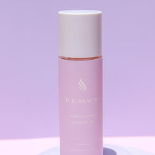 Load image into Gallery viewer, Close up of Femvy Stretch Mark Oil and Scar Treatment bottle